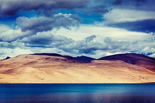 Vintage retro effect filtered hipster style travel image of Himalayan mountain lake in Himalayas Tso Moriri