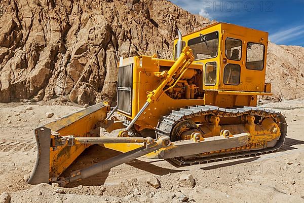 Bulldozer doing road construction in Himalayas. Ladakh