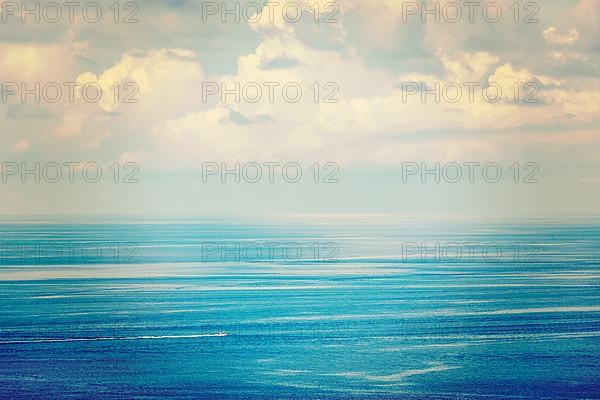 Vintage retro effect filtered hipster style travel image of speeding boat in blue sea. Andaman Sea