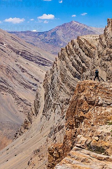 Photographer taking photos in Himalayas mountains. Spiti valley