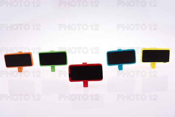 Colorful little signboards on a white background