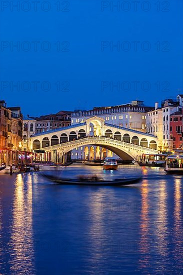 Rialto Bridge Rialto Bridge over Canal Grand with Gondola Holiday Travel City by Night in Venice