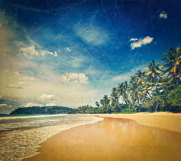 Vintage retro hipster style travel image of tropical vacation holiday background