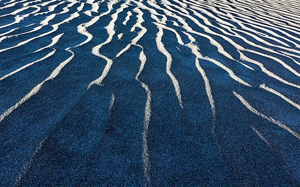 Shadow and light on Nubra Valley dunes sand close up on sunrise. Ladakh