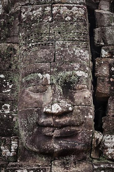 Ancient stone face of Bayon temple