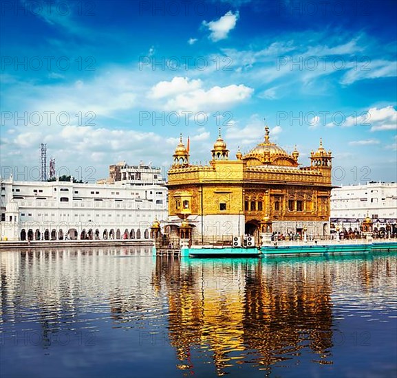 Vintage retro effect filtered hipster style travel image of Sikh gurdwara Golden Temple