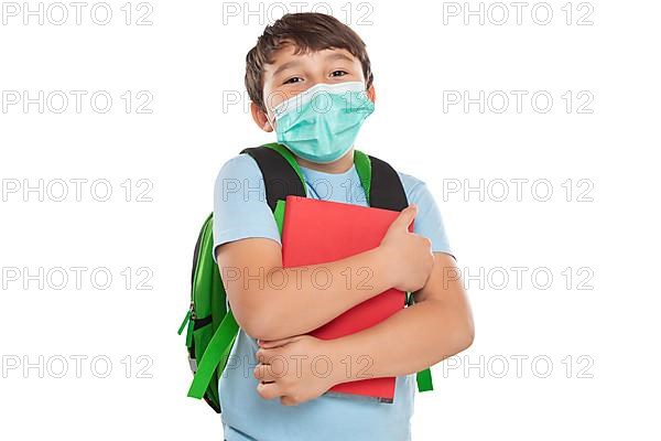 Young pupil child boy with mask against corona virus corona virus isolated exempted in Stuttgart