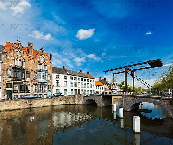 Canal with old bridge. Bruges