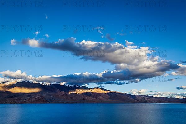 Himalayan mountain lake in Himalayas Tso Moriri on sunset