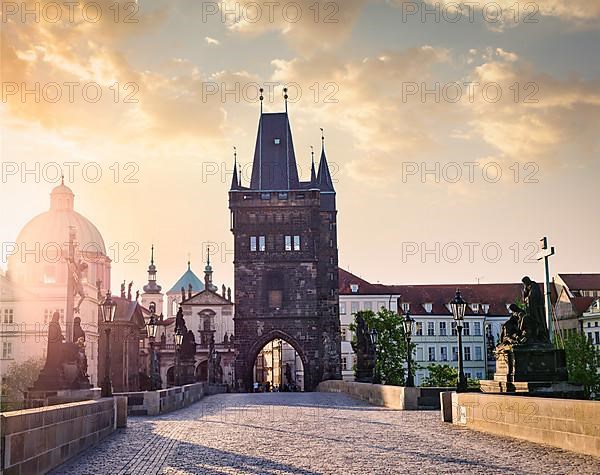 Charles bridge tower in Prague on sunrise