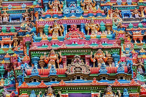 Sculptures on Hindu temple gopura tower. Meenakshi Temple