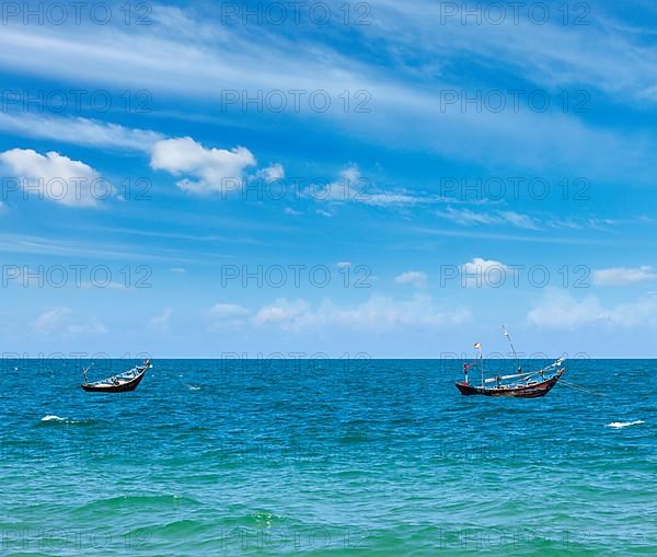 Fishing boats in sea. Mui Ne