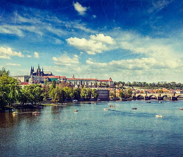 Vintage retro hipster style travel image of Vltava river and Gradchany