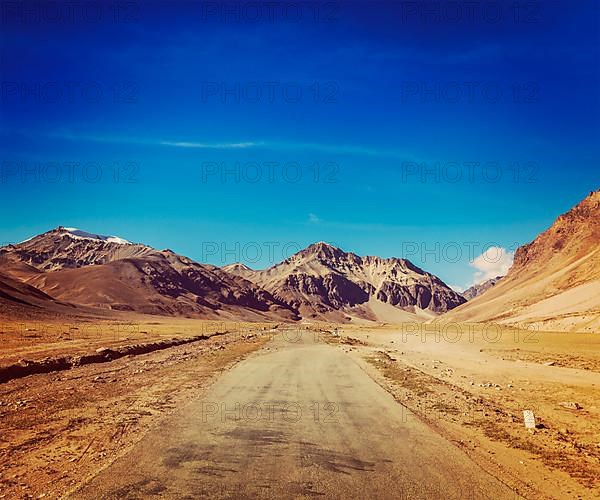 Vintage retro effect filtered hipster style travel image of Manali-Leh road to Ladakh in Indian Himalayas near Sarchu. Ladakh