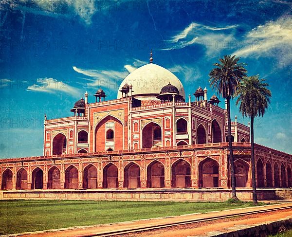 Vintage retro hipster style travel image of Humayun's Tomb with overlaid grunge texture. Delhi