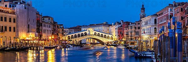 Rialto Bridge Rialto Bridge over Canal Grand with Gondola Vacation Travel City Panorama at Night in Venice
