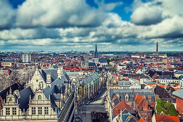 Vintage retro hipster style travel image of aerial view of Ghent from Belfry. Ghent