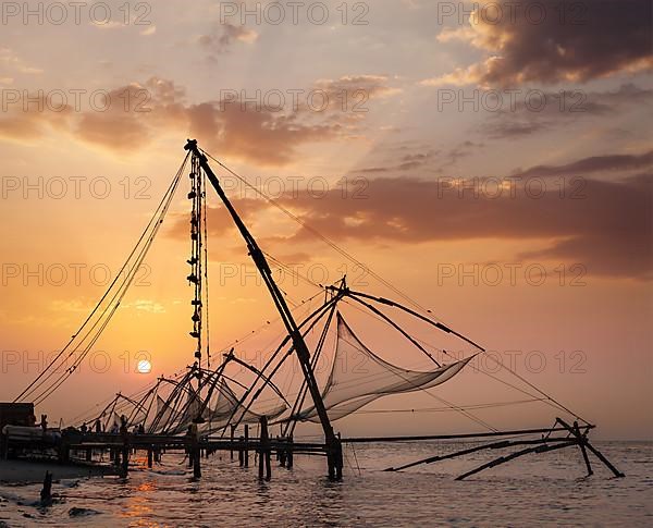 Kochi chinese fishnets on sunset. Fort Kochin