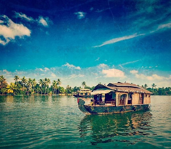 Vintage retro hipster style travel image of travel tourism Kerala background