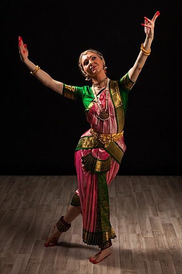 Young beautiful woman dancer exponent of Indian classical dance Bharatanatyam