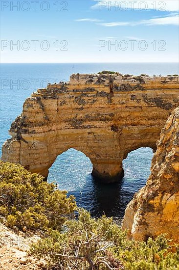 Algarve beach Praia da Marinha by the sea Rock formation in the shape of a heart Ocean in Praia da Marinha