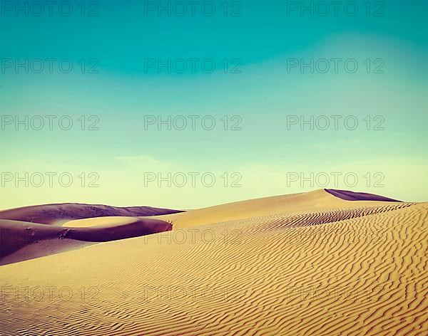 Vintage retro hipster style travel image of dunes of Thar Desert. Sam Sand dunes