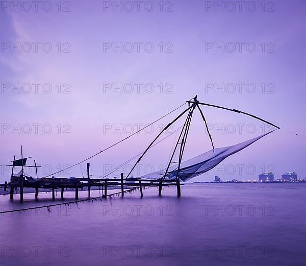 Kochi chinese fishnets on sunset. Fort Kochin