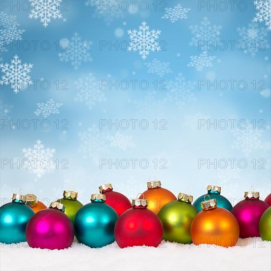 Christmas many colourful Christmas balls decoration square snowflakes snow winter text free space in Stuttgart