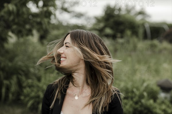 Laughing young woman in portrait