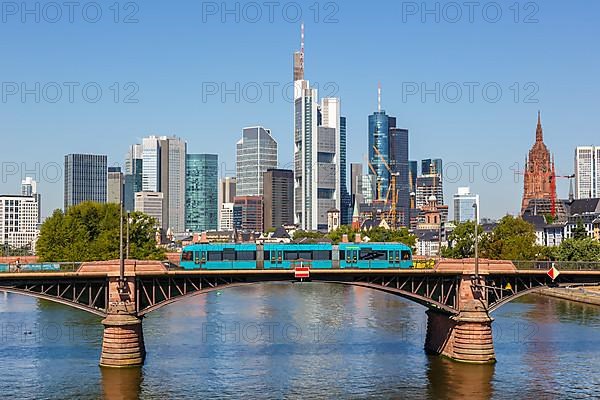Skyline with river Main and light rail on Ignatz Bubis bridge Travel in Frankfurt