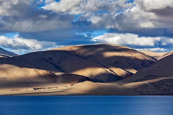 Himalayan mountain lake in Himalayas Tso Moriri on sunset