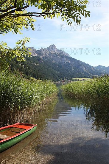 Haldensee with view of Gimpel and Rote Flueh in the Tannheim Valley