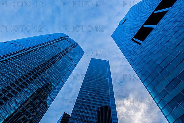 Urban buildings skyscrapers in sky on sunset. Singapore