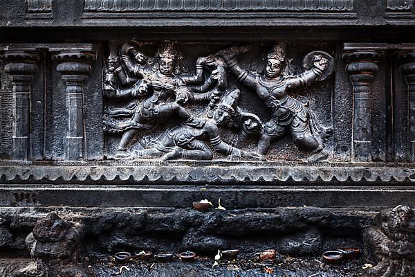 Bas relief depicting Durga slaying demon