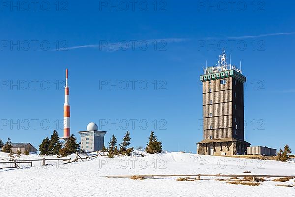 Summit of the Brocken mountain in the Harz mountains with snow in winter at the Brocken