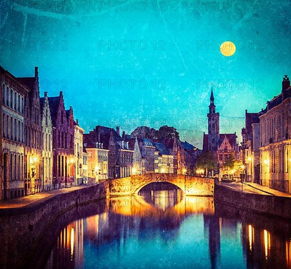 Vintage retro hipster style travel image of European medieval night city view background