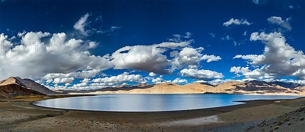 Panorama of Himalayas and Himalayan lake Tso Moriri on sunset