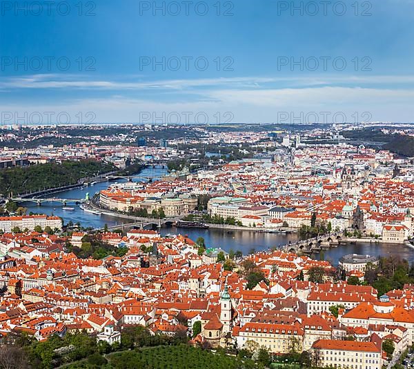 Aerial view of Charles Bridge over Vltava river and Old city from Petrin hill Observation Tower. Prague