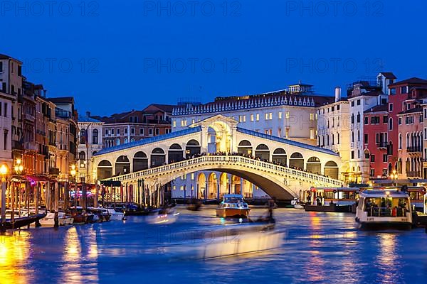 Rialto Bridge Rialto Bridge over Canal Grand with Gondola Holiday Travel City by Night in Venice