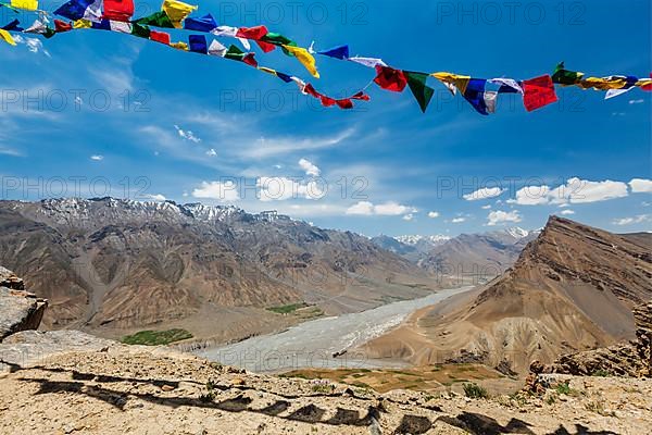 Buddhist prayer flags lungta in Spiti valley. Dhankar