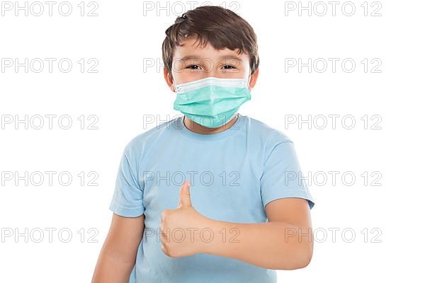 Child Boy with Mask against Corona Virus Corona Virus Showing Thumbs Up Isolated Released in Stuttgart