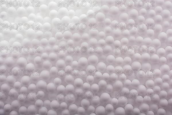 White little polystyrene foam balls as background