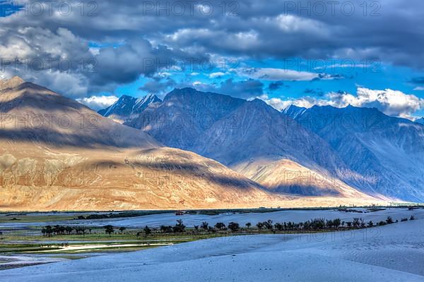 High dynamic range image valley in Himalayas. with sand dunes. Hunder