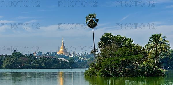 Panorama of Shwedagon Pagoda over Kandawgyi Lake in Yangon