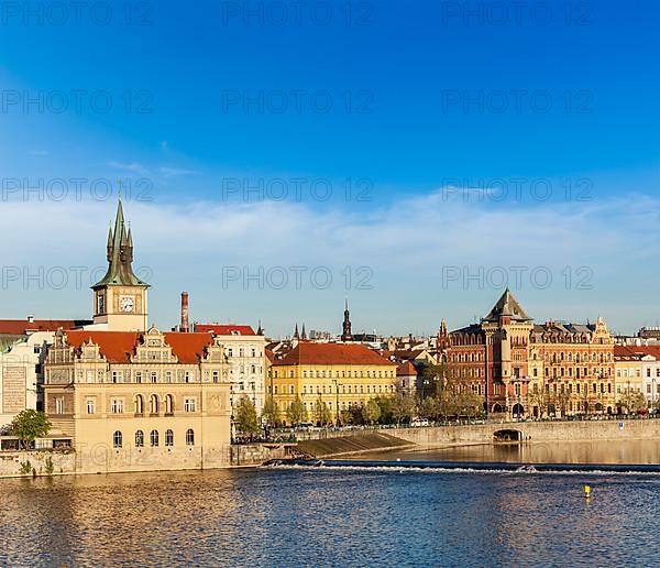 Prague Stare Mesto embankment view from Charles bridge on sunset. Prague