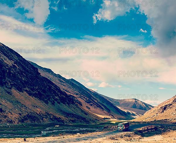 Vintage retro effect filtered hipster style travel image of Indian lorry on Manali-Leh Road. Ladakh