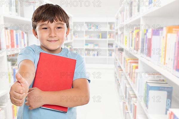 Young Pupil Child Boy Showing Thumbs Up at School with copy space Copyspace in Stuttgart