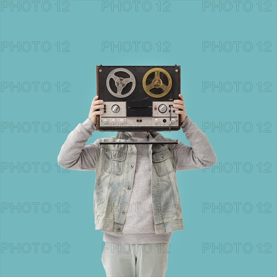 Young boy with cassette. Resolution and high quality beautiful photo