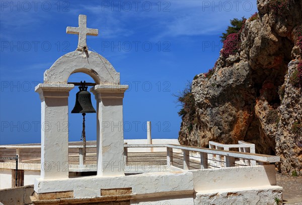 Bell tower of the monastery in the mountains near the coastal road to Agios Nikolaos