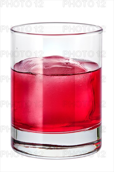 Glass of cold cranberry juice with ice isolated on white